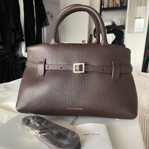 Manu Atelier Cambon 25 in Deep rich brown with gold hardware.